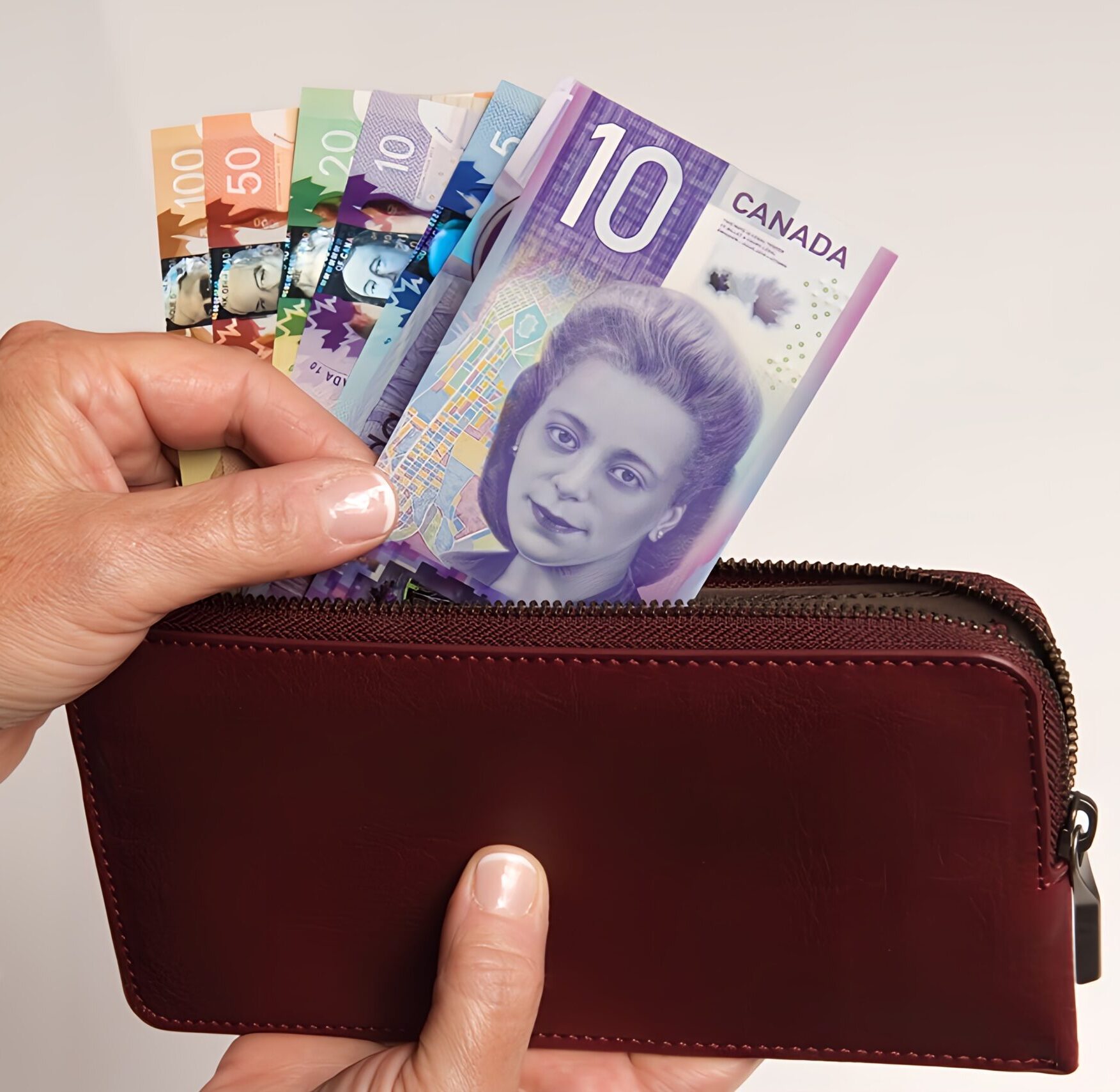 Canadian dollar bills in wallet